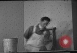 Image of One armed paperhanger United States USA, 1943, second 17 stock footage video 65675053440