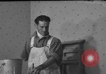 Image of One armed paperhanger United States USA, 1943, second 19 stock footage video 65675053440
