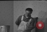 Image of One armed paperhanger United States USA, 1943, second 26 stock footage video 65675053440