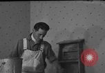 Image of One armed paperhanger United States USA, 1943, second 27 stock footage video 65675053440