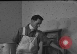 Image of One armed paperhanger United States USA, 1943, second 28 stock footage video 65675053440