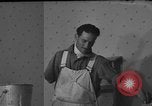 Image of One armed paperhanger United States USA, 1943, second 29 stock footage video 65675053440