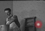 Image of One armed paperhanger United States USA, 1943, second 30 stock footage video 65675053440