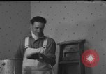 Image of One armed paperhanger United States USA, 1943, second 31 stock footage video 65675053440