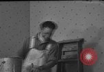 Image of One armed paperhanger United States USA, 1943, second 32 stock footage video 65675053440