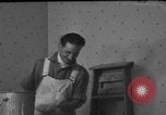 Image of One armed paperhanger United States USA, 1943, second 33 stock footage video 65675053440