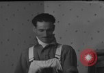 Image of One armed paperhanger United States USA, 1943, second 36 stock footage video 65675053440