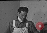Image of One armed paperhanger United States USA, 1943, second 39 stock footage video 65675053440