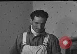 Image of One armed paperhanger United States USA, 1943, second 40 stock footage video 65675053440