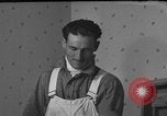 Image of One armed paperhanger United States USA, 1943, second 41 stock footage video 65675053440