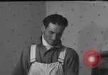 Image of One armed paperhanger United States USA, 1943, second 42 stock footage video 65675053440
