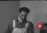 Image of One armed paperhanger United States USA, 1943, second 43 stock footage video 65675053440