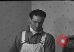 Image of One armed paperhanger United States USA, 1943, second 44 stock footage video 65675053440
