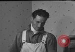 Image of One armed paperhanger United States USA, 1943, second 47 stock footage video 65675053440