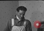 Image of One armed paperhanger United States USA, 1943, second 48 stock footage video 65675053440