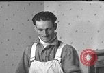 Image of One armed paperhanger United States USA, 1943, second 50 stock footage video 65675053440