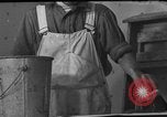 Image of One armed paperhanger United States USA, 1943, second 56 stock footage video 65675053440