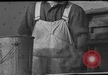 Image of One armed paperhanger United States USA, 1943, second 58 stock footage video 65675053440