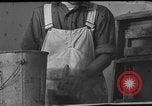 Image of One armed paperhanger United States USA, 1943, second 59 stock footage video 65675053440