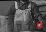 Image of One armed paperhanger United States USA, 1943, second 62 stock footage video 65675053440