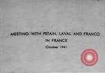 Image of Adolf Hitler shaking hands with Petain in Montoire France, 1940, second 4 stock footage video 65675053449