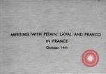 Image of Adolf Hitler shaking hands with Petain in Montoire France, 1940, second 5 stock footage video 65675053449