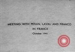 Image of Adolf Hitler shaking hands with Petain in Montoire France, 1940, second 9 stock footage video 65675053449