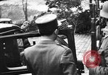 Image of Adolf Hitler shaking hands with Petain in Montoire France, 1940, second 15 stock footage video 65675053449