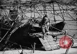 Image of Japanese barge Okinawa Ryukyu Islands, 1945, second 39 stock footage video 65675053475