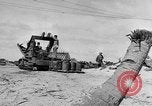 Image of amphibious invasion Pacific Theater, 1944, second 6 stock footage video 65675053522