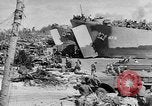 Image of amphibious invasion Pacific Theater, 1944, second 15 stock footage video 65675053522