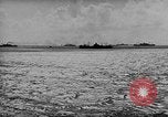 Image of amphibious invasion Pacific Theater, 1944, second 16 stock footage video 65675053522