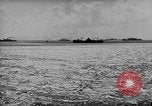 Image of amphibious invasion Pacific Theater, 1944, second 17 stock footage video 65675053522