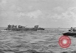 Image of amphibious invasion Pacific Theater, 1944, second 22 stock footage video 65675053522