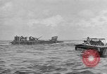 Image of amphibious invasion Pacific Theater, 1944, second 23 stock footage video 65675053522