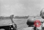Image of amphibious invasion Pacific Theater, 1944, second 25 stock footage video 65675053522