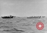 Image of amphibious invasion Pacific Theater, 1944, second 27 stock footage video 65675053522
