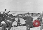 Image of amphibious invasion Pacific Theater, 1944, second 33 stock footage video 65675053522