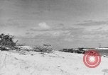 Image of amphibious invasion Pacific Theater, 1944, second 57 stock footage video 65675053522