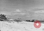 Image of amphibious invasion Pacific Theater, 1944, second 58 stock footage video 65675053522