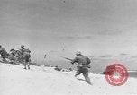 Image of amphibious invasion Pacific Theater, 1944, second 60 stock footage video 65675053522