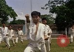 Image of karate class South Vietnam, 1967, second 21 stock footage video 65675053590