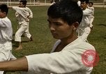 Image of karate class South Vietnam, 1967, second 46 stock footage video 65675053590