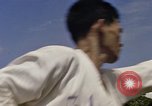 Image of karate class South Vietnam, 1967, second 47 stock footage video 65675053590