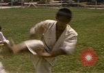 Image of karate class South Vietnam, 1967, second 18 stock footage video 65675053591