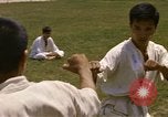 Image of karate class South Vietnam, 1967, second 21 stock footage video 65675053591