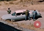 Image of vehicle ambush counter-attack ramming techniques California United States USA, 1976, second 21 stock footage video 65675053608