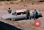 Image of vehicle ambush counter-attack ramming techniques California United States USA, 1976, second 22 stock footage video 65675053608