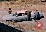 Image of vehicle ambush counter-attack ramming techniques California United States USA, 1976, second 23 stock footage video 65675053608