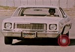 Image of vehicle ambush counter-attack ramming techniques California United States USA, 1976, second 32 stock footage video 65675053608